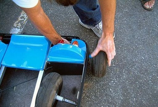 Illustration for article titled It's a Go-Kart That Folds Into a Suitcase. Any Questions?
